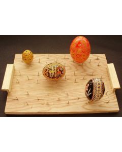 DRYING BOARD Holding up to 15 eggs for varnishing. It can also be used to melt wax from the egg in the oven